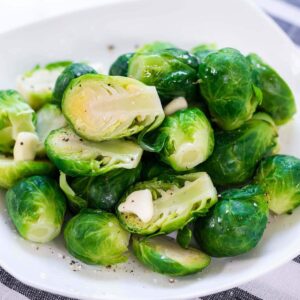 Steam Brussels Sprouts on a white plate